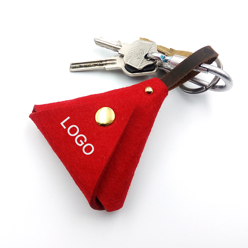 Introducing our chic and functional triangle-shaped leather storage bag