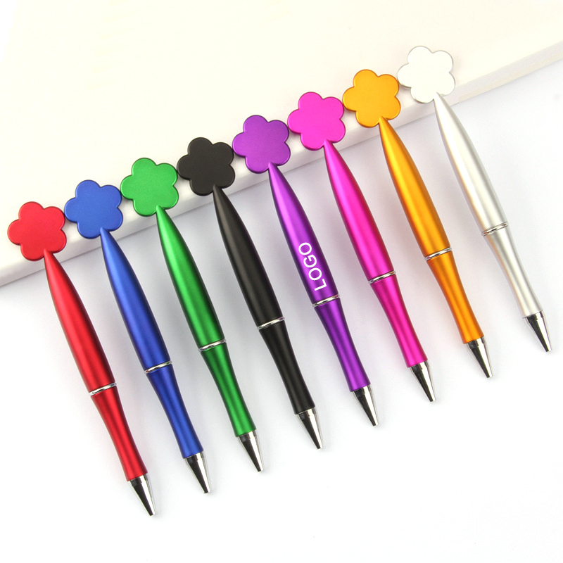 Introducing the exquisite ballpoint pen with a delicate flower-shaped top